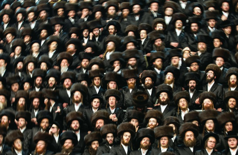Ultra orthodox Jews wear shtreimels to a traditional religious wedding ceremony in Jerusalem. (credit: REUTERS)