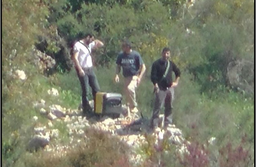 Openly armed Hezbollah members spotted near the Israeli border.
