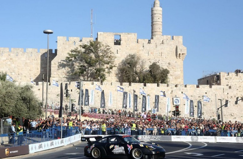 Formula 1 drivers participate in an exhibition in Jerusalem