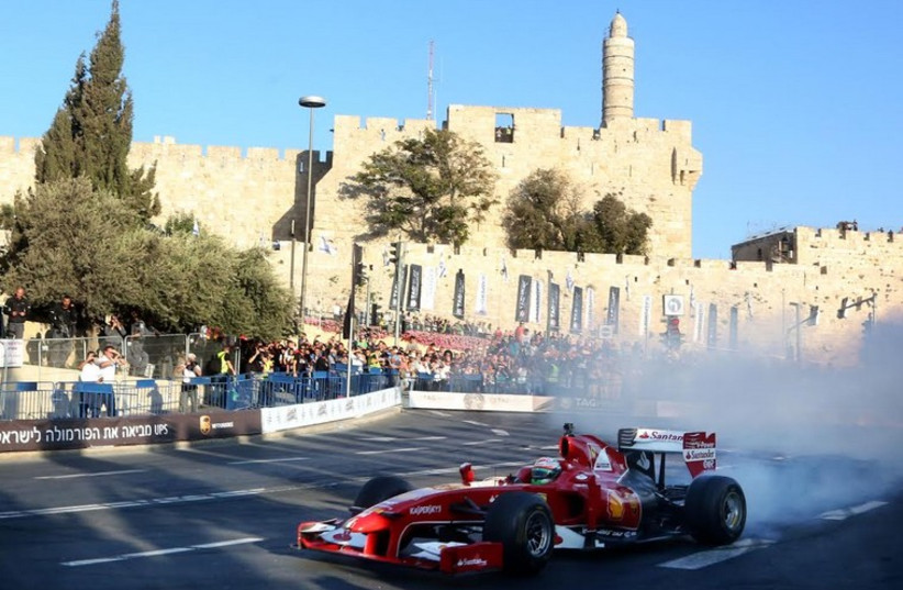 Formula 1 drivers participate in an exhibition in Jerusalem
