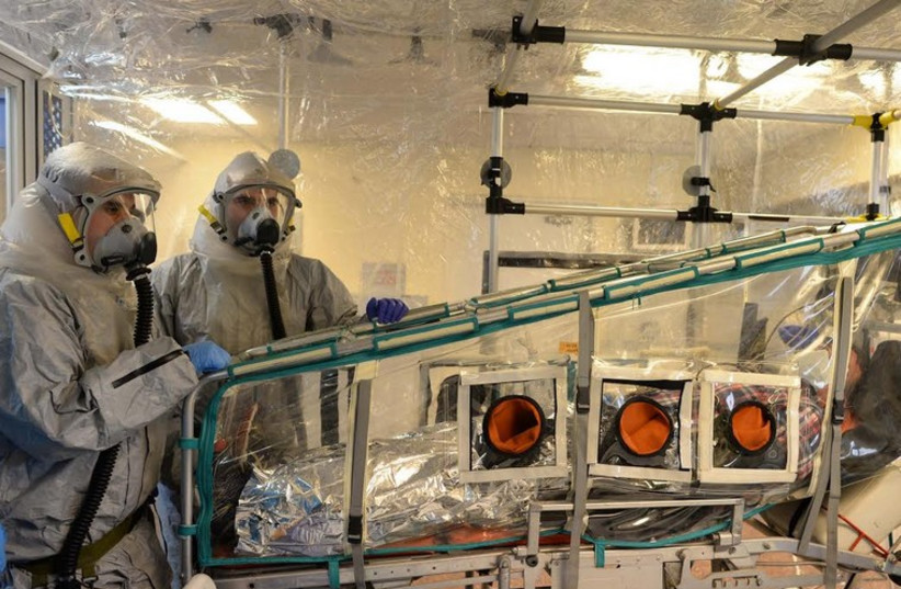 Ebola screening drill held at Ben-Gurion Airport, October 17, 2014.