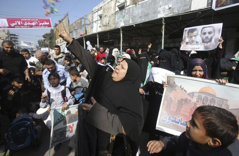 Gazans in Rafah celebrate the attack on a Jerusalem synagogue, November 18, 2014.‏