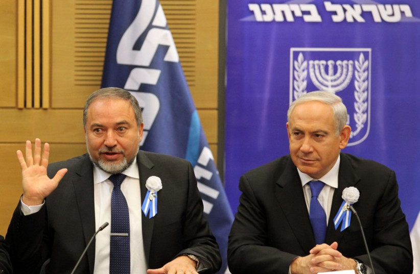 Avigdor Liberman and Benjamin Netanyahu (credit: MARC ISRAEL SELLEM)