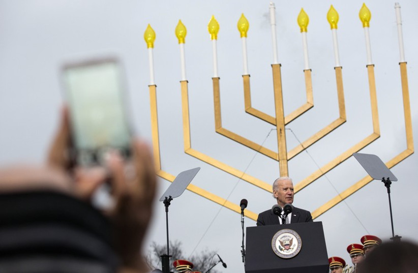 US Vice President Joe Biden speaks during the annual lighting of the National Hanukkah Menorah on the Ellipse in Washington