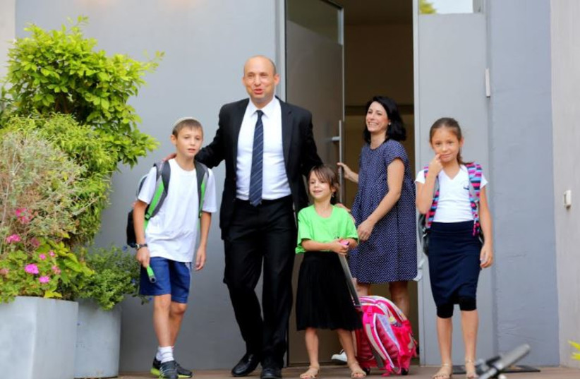 Education Minister Naftali Bennett with his family on the first day of school, September 1, 2015