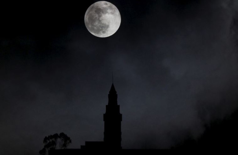 A supermoon is seen in the sky in Bogota, Colombia