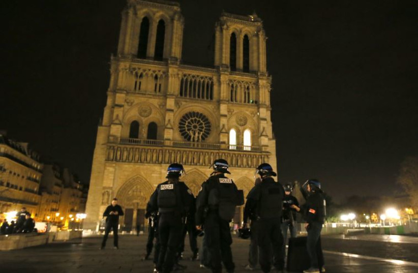 Police patrol near Notre Dame Cathedral following a series of deadly attacks in Paris , November 14, 2015