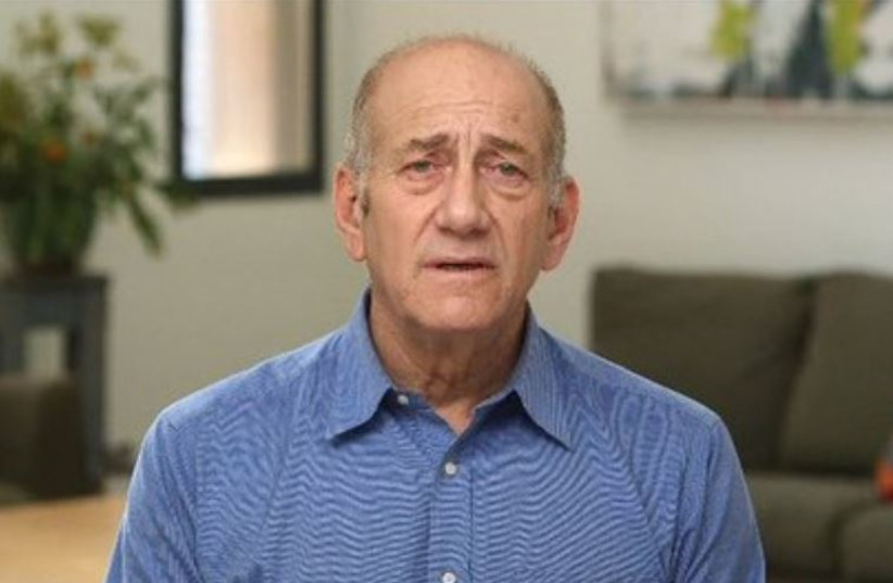 Ehud Olmert tapes a statement prior to his entering prison