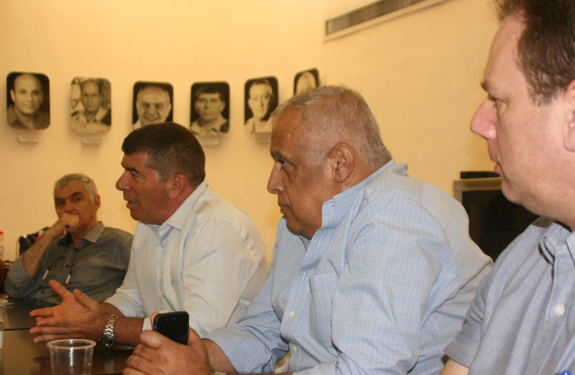 Delegation members and participants (from left): Dr. Moshe Shemma, col. res. and executive director of ZDVF; Gabi Ashkenazi, former chief of general staff; and Haim Ronen, executive director of ZVDO.  (photo credit: AYELET GABAI)