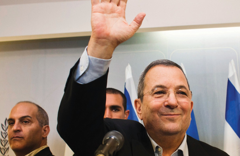 THEN DEFENSE Minister Ehud Barak arrives at the weekly cabinet meeting in Jerusalem in 2012 (photo credit: REUTERS)