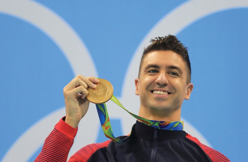 Less than a year after winning two gold medals at the Rio Olympics, American Anthony Ervin will be competing today at the swimming events of the 20th Maccabiah at the Wingate Institute. (photo credit: REUTERS)