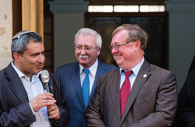AT THE REDEDICATION ceremony for the St. Sergius Mission in Jerusalem yesterday are (from left) Jerusalem Affairs Minister Ze’ev Elkin; Sergey Stepashin and Igor Ashurbeyli, chairman and director, respectively, of the Imperial Orthodox Palestine Society; and Bishop Antony of Bogorodsk, administrator (photo credit: ALEXANDER OMELIANCHUK)