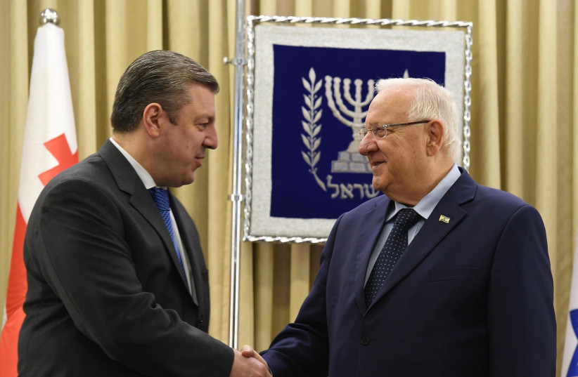 Israeli President Reuven Rivlin with Georgian Prime Minister Giorgi Kvirikashvili (photo credit: Mark Neiman/GPO)
