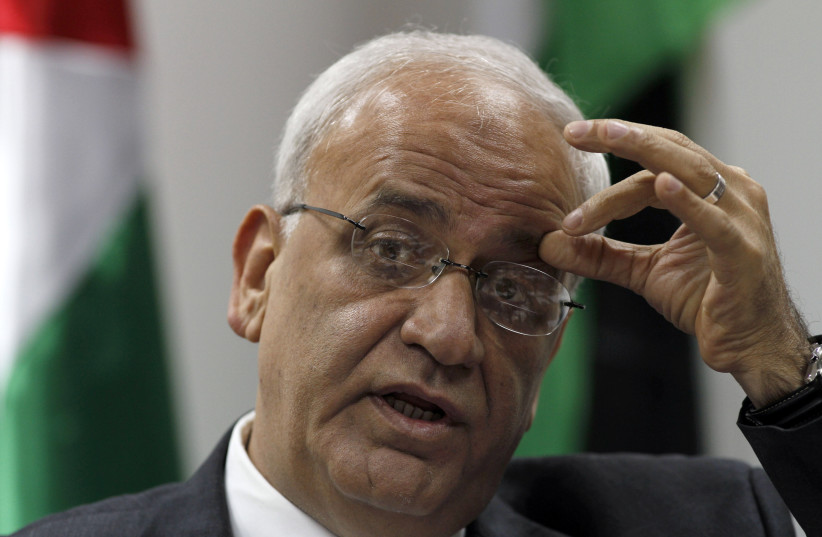 Chief Palestinian negotiator Saeb Erekat speaks during a news conference in the West Bank city of Ramallah January 2, 2012. (photo credit: REUTERS)