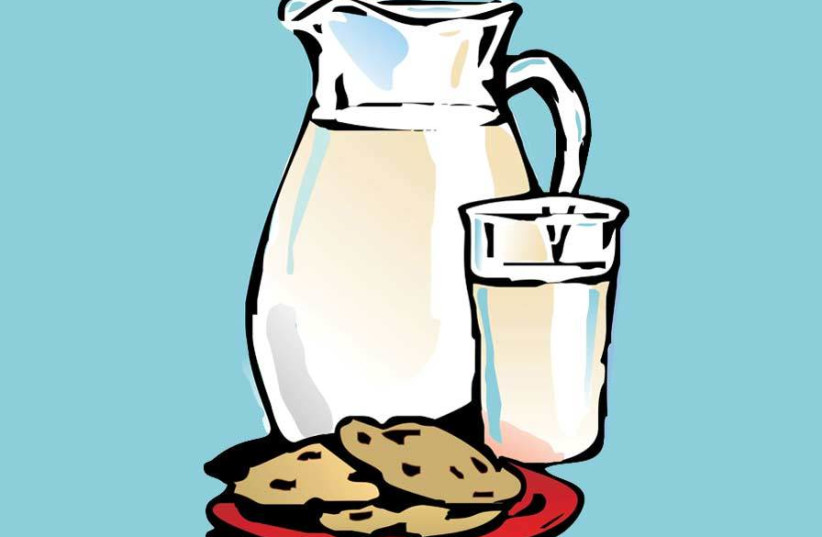 A jar of milk (photo credit: PAUL SCHMID/MCT DIRECT)