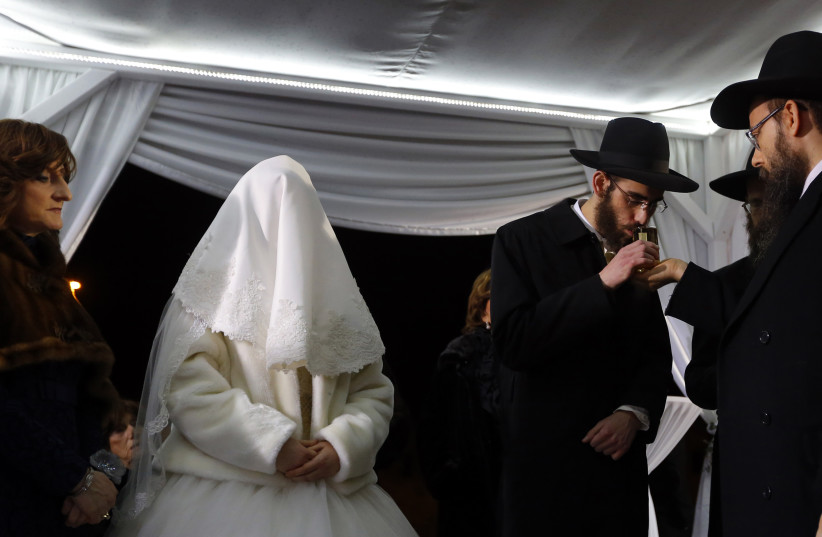 An Orthodox wedding ceremony (photo credit: LASZIO BALOGH/REUTERS)