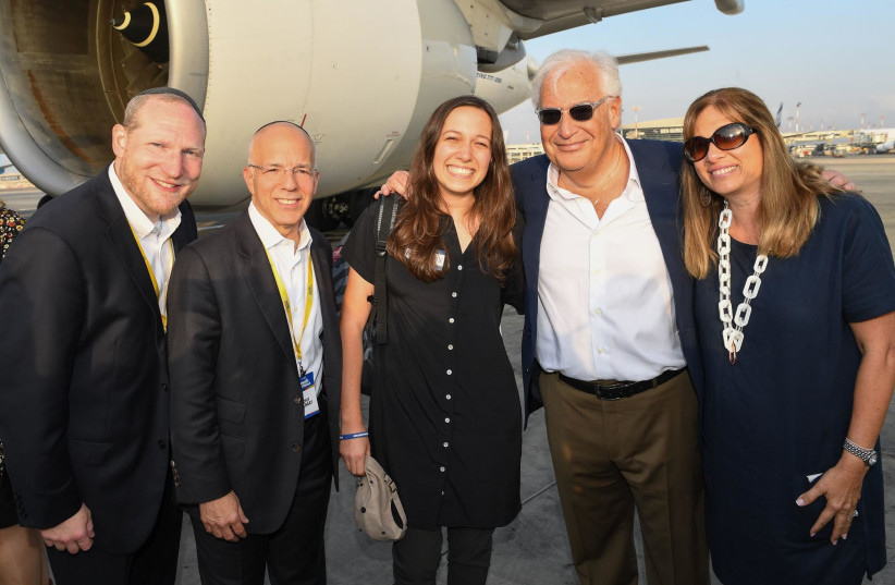 US Ambassador to Israel David Friedman greets his daughter at the airport as she makes aliya  (photo credit: SHAHAR AZRAN)