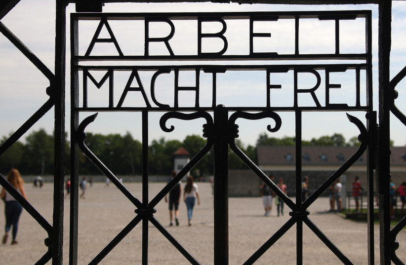 The entrance of the former German Nazi concentration camp in Dachau near Munich, Germany. (credit: REUTERS)