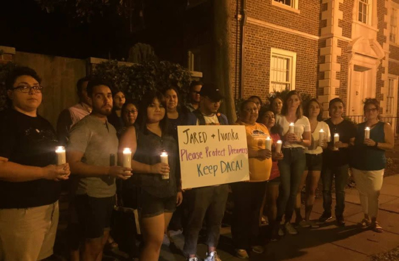 Protesters hold a candlelit vigil at the home of Ivanka Trump and Jared Kushner (photo credit: CRIS RUIZ ON TWITTER @VOTECRIS2040)
