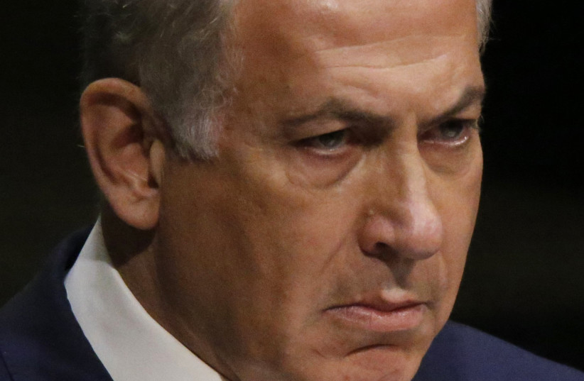 Israeli Prime Minister Benjamin Netanyahu pauses while addressing attendees during the 70th session of the United Nations General Assembly at the U.N. Headquarters in New York, October 1, 2015.  (photo credit: CARLO ALLEGRI/REUTERS)