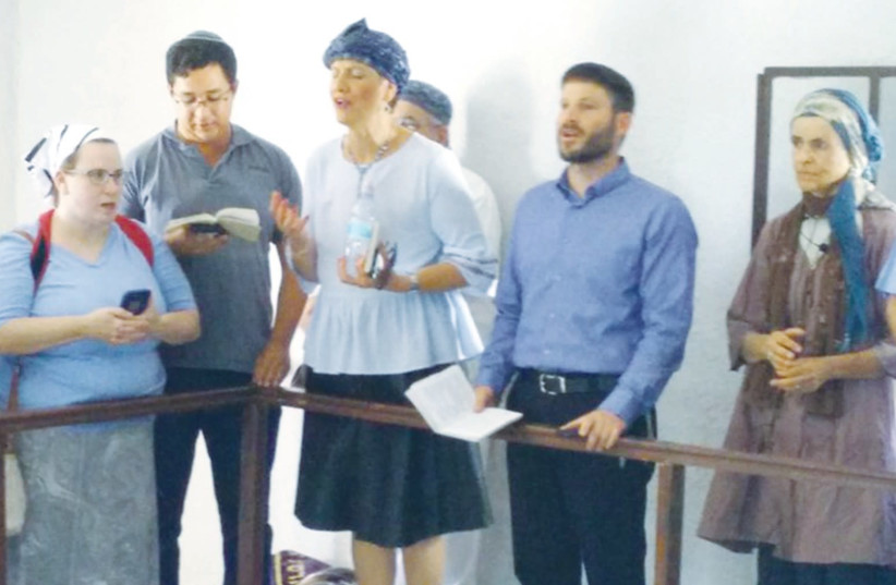 MKS SHULI MOALEM-REFAELI (center) and Bezalel Smotrich (second right) recite ‘slichot’ yesterday at the Shalom Al Yisrael synagogue in Jericho (photo credit: TWITTER)