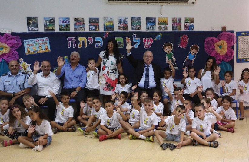 President Reuven Rivlin joins first graders on the first day of school at the Nofei Hasela Elementary School in Ma’ale Adumim. (photo credit: MARC ISRAEL SELLEM)