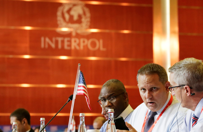 US delegates attend the 86th INTERPOL General Assembly at Beijing National Convention Center in Beijing, China (photo credit: REUTERS)