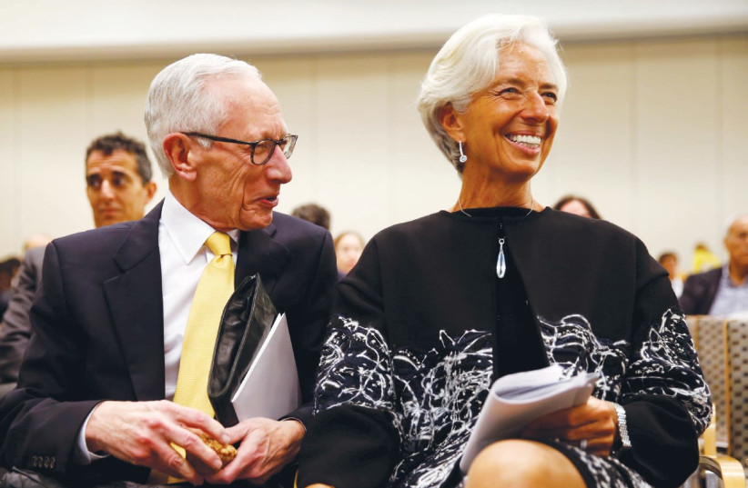 Stanley Fischer with IMF Managing Director Christine Lagarde in Washington in November 2016. (photo credit: KEVIN LAMARQUE/REUTERS)