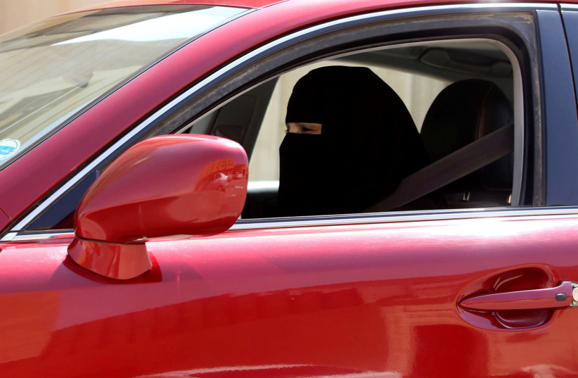 A woman drives a car in Riyadh Saudi Arabia (photo credit: REUTERS/FAISAL AL NASSER)