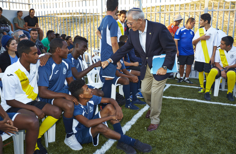 Holocaust survivor George Blank inaugurated a new soccer field for the Yemin Orde youth village in northern Israel, October 17, 2017. (photo credit: DIMA VALERSHTEIN)