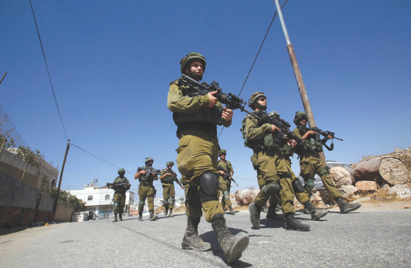 SOLDIERS ON patrol in the West Bank. (photo credit: REUTERS)