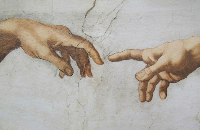 DETAIL FROM Michelangelo’s ‘Creation of Adam’ fresco (1509) in the Vatican’s Sistine Chapel. (photo credit: Wikimedia Commons)