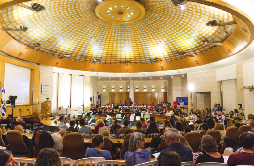 The Jerusalem Street Orchestra performs at the Jerusalem Municipality’s city council hall.  (photo credit: YELENA KVETNY)