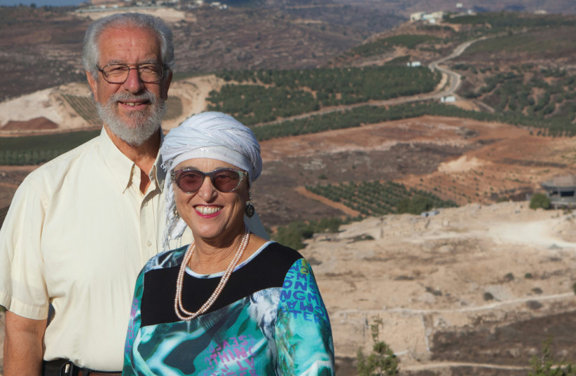 YISRAEL AND BATYA Medad on a hill overlooking Tel Shiloh and the Shiloh vineyards (photo credit: MIRIAM FEYGA BUNIMOVICH)