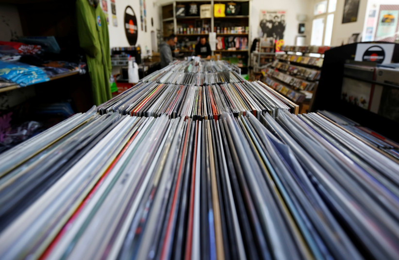 Vinyl albums are seen in the Recordbag shop ahead of the International Record Store day in Vienna, Austria, April 21, 2017.  (photo credit: REUTERS/ LEONHARD FOEGER)