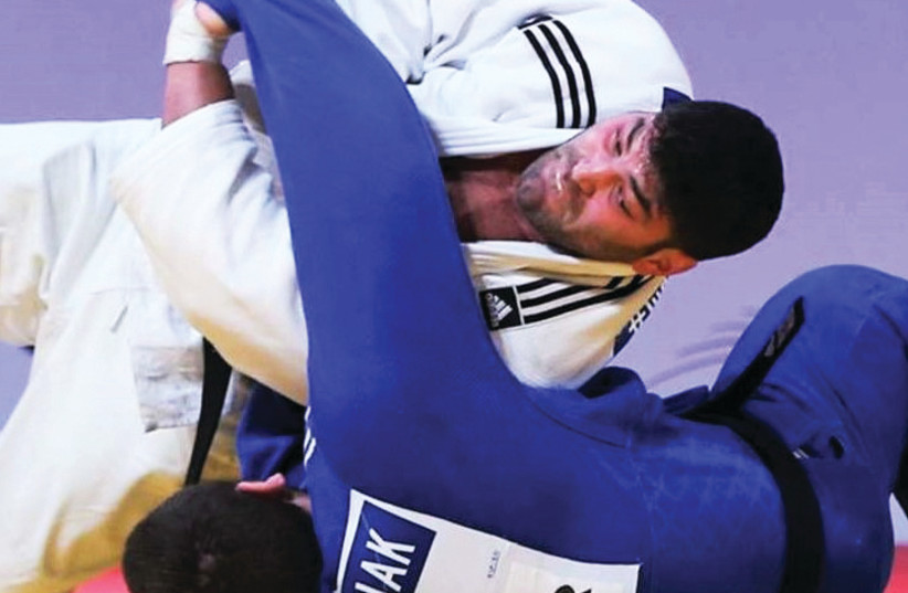 Ori Sasson (top) is waiting to receive official confirmation of his participation at the Openweight World Championships in Marrekech before departing for Morocco. (photo credit: INTERNATIONAL JUDO FEDEREATION/COURTESY)