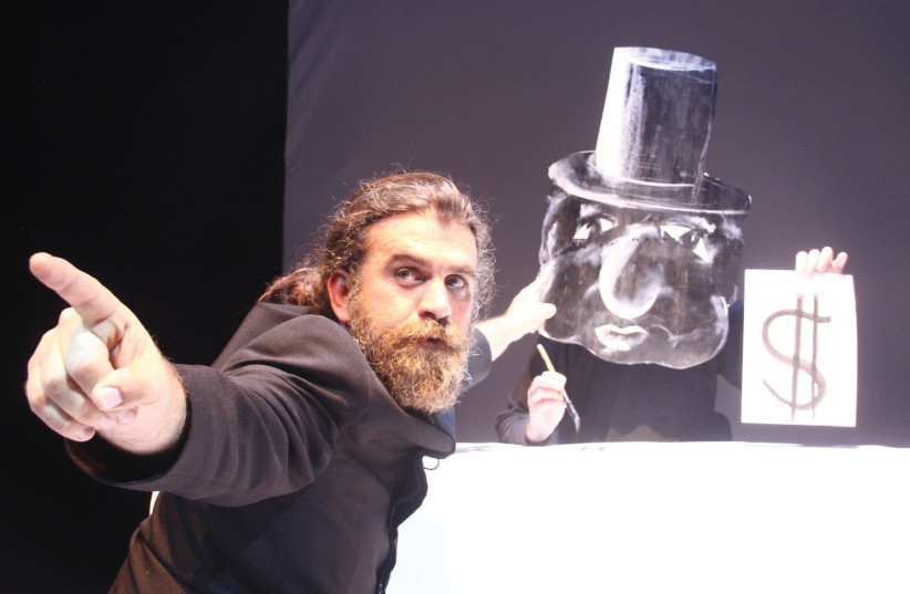 Efim Rinenberg stars in Mikro Theater’s production of ‘Herzlmania.’ (photo credit: YVGENI YESHINSKI)