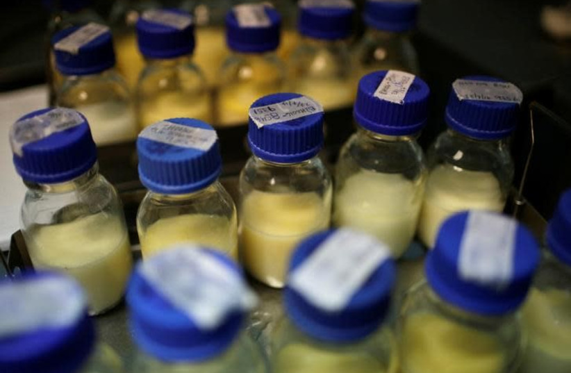 Bottles with breast milk donated by nursing mothers (photo credit: REUTERS/SAUL MARTINEZ)