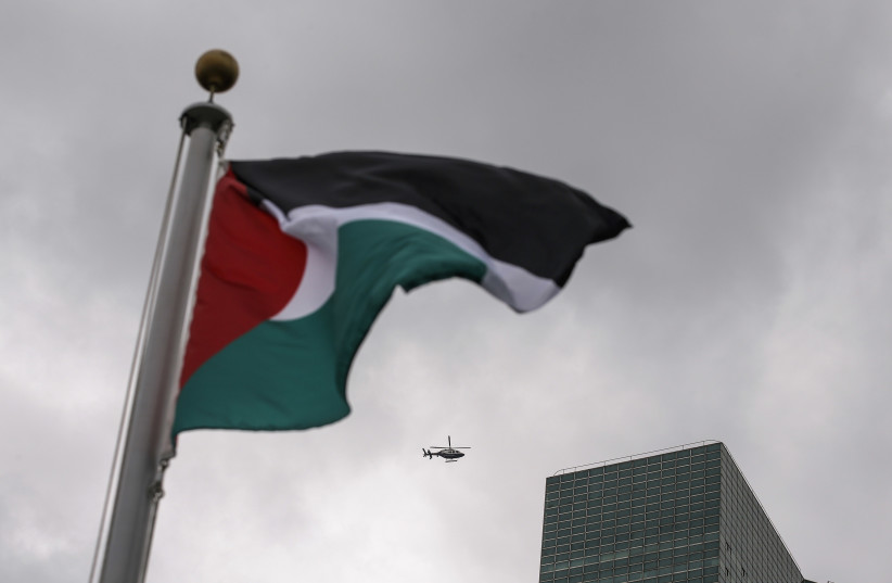 The Palestinian flag flies after being raised by Palestinian President Mahmoud Abbas in a ceremony outside the United Nations in New York, September 30, 2015. (photo credit: REUTERS)