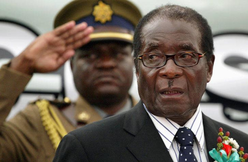 Zimbabwe President Robert Mugabe attends the launch of basic commodities in Harare, Zimbabwe July 16, 2008. (photo credit: REUTERS/PHILIMON BULAWAYO)
