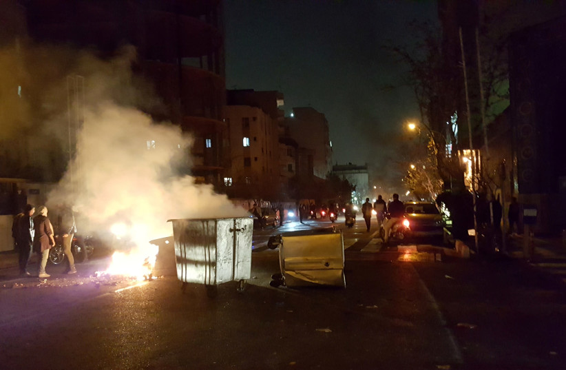 People protest in Tehran, Iran December 30, 2017 in this picture obtained from social media (photo credit: REUTERS)