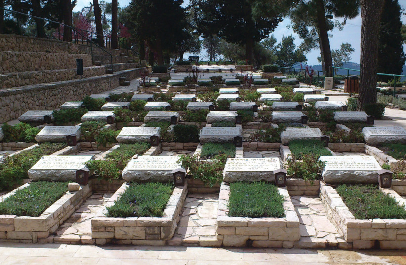 THE GRAVES of the Convoy of 35 in Jerusalem’s Mount Herzl Cemetery (photo credit: Wikimedia Commons)