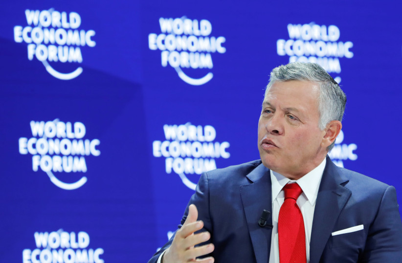Jordan's King Abdullah speaks at the World Economic Forum in Davos, Switzerland (photo credit: DENIS BALIBOUSE / REUTERS)