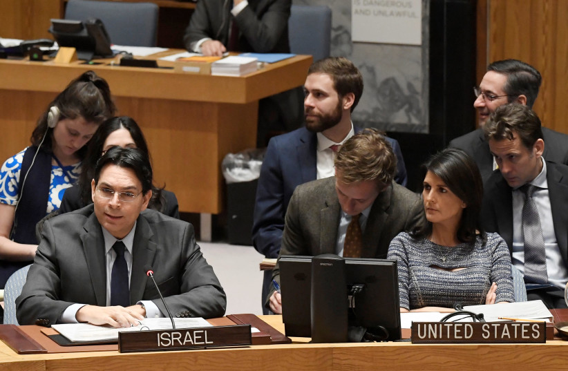 Israeli Ambassador to the UN Danny Danon with his US counterpart Nikki Haley, January 25, 2018. (photo credit: EVAN SCHNEIDER/UN)