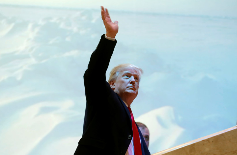 US President Donald Trump arrives at the World Economic Forum annual meeting in Davos (photo credit: REUTERS/CARLOS BARRIA)