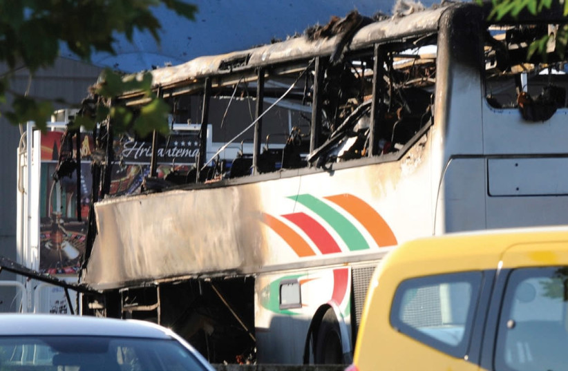 A BUS IS seen at the airport in Burgas, Bulgaria, on July 18, 2012, after terrorists blew it up as it transported Israeli tourists to their hotels. (photo credit: REUTERS)