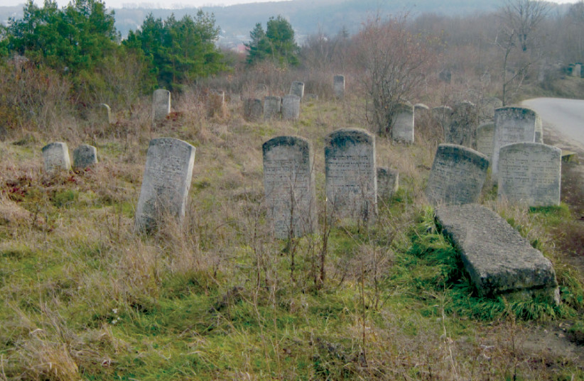 WHAT REMAINS of the Jewish cemetery in Buczacz today (photo credit: Wikimedia Commons)
