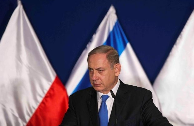 Israeli Prime Minister Benjamin Netanyahu delivers a joint statement with his Polish counterpart Beata Szydlo (not pictured) after their meeting in Jerusalem November 22, 2016 (photo credit: REUTERS/NIR ELIAS)