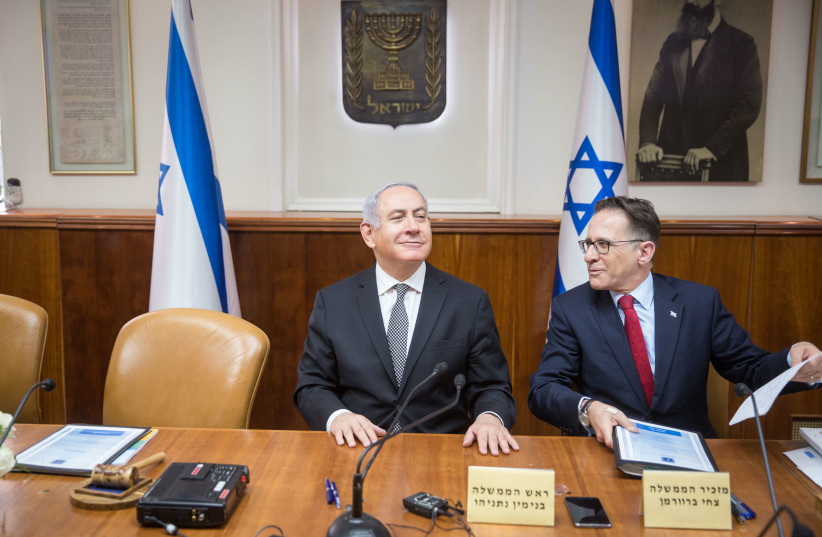 Prime Minister Benjamin Netanyahu at a weekly cabinet meeting on February 25th, 2018. (photo credit: EMIL SALMAN/POOL)