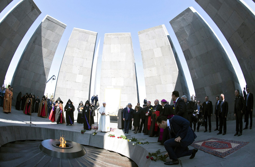 Pope Francis and Catholicos of All Armenians Karekin II attend a ceremony in commemoration of Armenians killed by Ottoman forces during World War One at the Tzitzernakaberd Genocide Memorial in Yerevan, Armenia, June 25, 2016. (photo credit: MAURIZIO BRAMBATTI/ REUTERS)